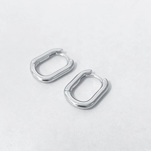 Minimalist silver U-shaped geometric hoop earrings with a high-polished mirror finish