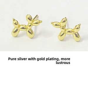Detailed close-up of S925 sterling silver gold-plated balloon dog stud earrings