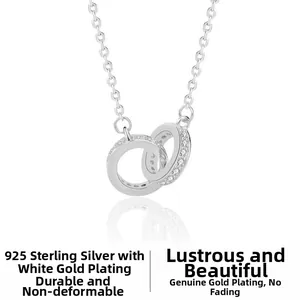 Macro shot of S925 sterling silver interlocking double ring pendant with pavé zircon stones