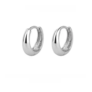 Macro view of thickened S925 sterling silver hoop earrings with polished finish and hallmark