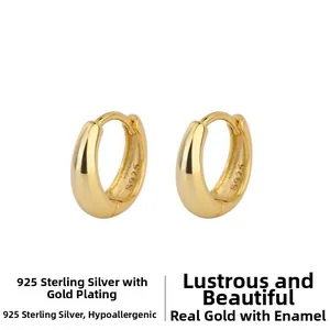 Detailed close-up of S925 sterling silver stamp on hypoallergenic gold hoop earrings