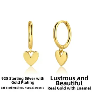 Detail of 925 sterling silver heart earrings with real gold plating and lacquer finish