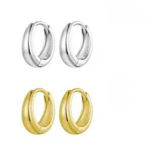 Macro shot of S925 sterling silver stamp on silver and gold teardrop hoop earrings