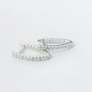 Elegant S925 sterling silver V-shaped earrings with pavé cubic zirconia gemstones