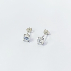 Classic S925 sterling silver four-prong stud earrings with round cubic zirconia stones