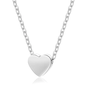 Macro view of polished silver triple heart pendant with mirror finish and link chain