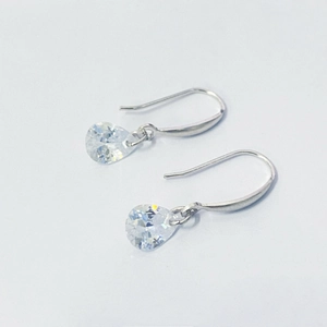Elegant S925 sterling silver drop earrings featuring teardrop cubic zirconia stones