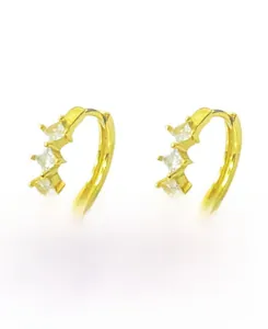 Detail of S925 sterling silver hoop earrings featuring three sparkling star-cut zircons