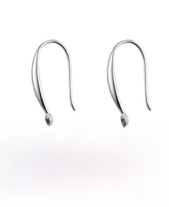 Detail of drop-shaped zircon earrings in S925 sterling silver with elegant hooks