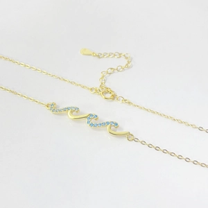 S925 sterling silver wave necklace with blue diamonds in gold plated fashion finish