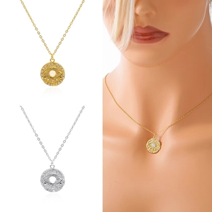 Close-up of S925 sterling silver evil eye coin pendant with moonstone and cubic zirconia