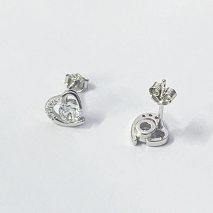 Minimalist S925 sterling silver heart stud earrings with sparkling round zirconia center