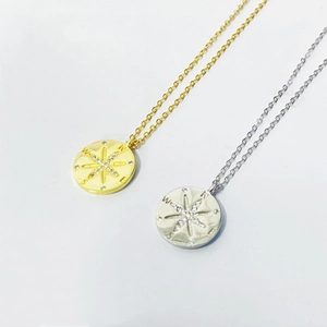 North Star compass pendant necklace in S925 silver with cubic zirconia in gold and silver