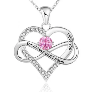 Detailed view of sterling silver infinity heart pendant with pink stone and engraving