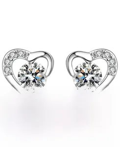Detailed view of S925 sterling silver heart stud earrings with sparkling cubic zirconia