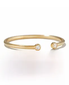 Detail of S925 sterling silver open ring featuring two sparkling round-cut cubic zirconias