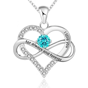 Detail of 925 silver infinity heart necklace with blue gemstone and romantic engraving