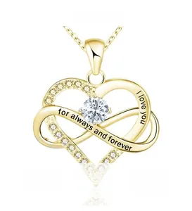 Detail of infinity heart pendant featuring a clear gemstone and I love you engraving