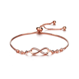 Bracelet infini en or rose avec zircons micro-pavés et fermoir coulissant réglable