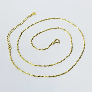 S925 sterling silver gold plated twisted rope chain with heart pendant on white background