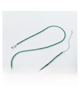 Detail of S925 sterling silver tennis chain featuring 2mm green zircon round stones
