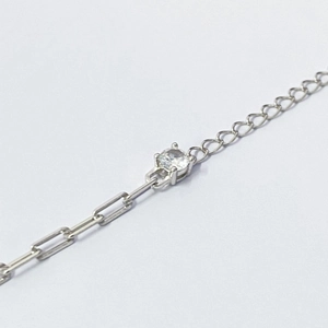 S925 sterling silver paperclip chain bracelet with a single four-prong cz diamond