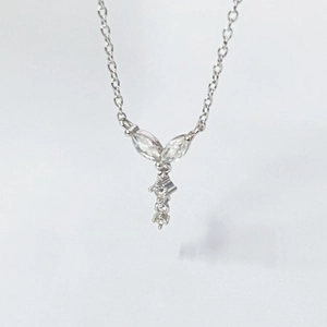 Elegant S925 silver marquise crystal necklace featuring symmetrical leaf pendant and fringe