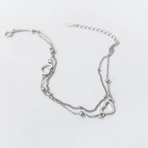 Minimalist S925 sterling silver double-layer bracelet with heart charms and beads