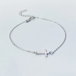 Minimalist S925 sterling silver cross bracelet with adjustable lobster clasp on white background