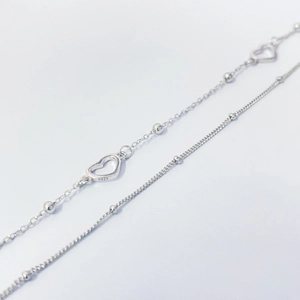 Elegant S925 sterling silver double-layer bracelet with hollow heart and silver beads