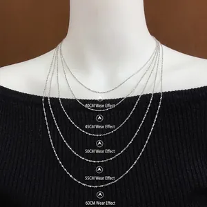 S925 sterling silver star necklace length guide showing 40cm to 60cm on model