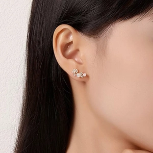 Elegant French vintage feather wing earrings with pearls and zircon on female model