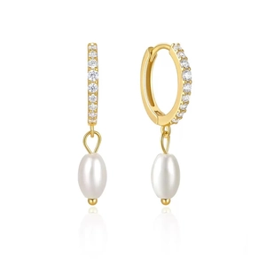 Elegant gold pearl drop earrings with zircon crystals on white mirror background