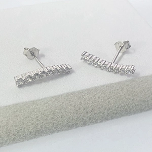 Close-up of S925 sterling silver bar earrings with sparkling row of cubic zirconia