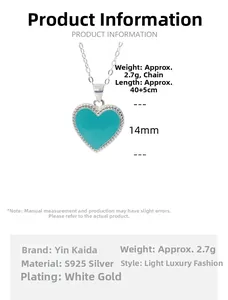 Detail of S925 silver heart necklace in light blue with silver beaded edge craftsmanship