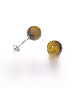 Detail of s925 silver stud earrings featuring natural tiger eye beads with butterfly back