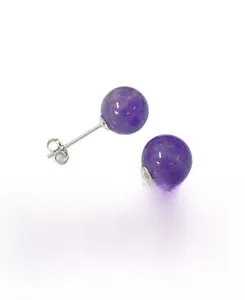 Detailed view of S925 sterling silver hallmarking on a minimalist purple amethyst stud earring