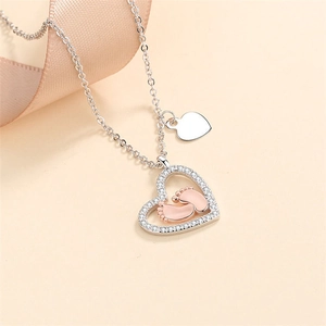 S925 sterling silver heart necklace with rose gold baby footprints and pavé crystals
