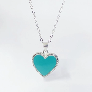 Elegant S925 sterling silver heart necklace with blue enamel and milgrain detail