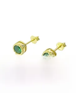 Detail view of gold-plated S925 silver stud earrings featuring emerald green zircon stones
