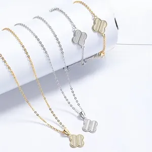 Detailed macro view of 925 silver clover necklace and bracelet set with radial textures