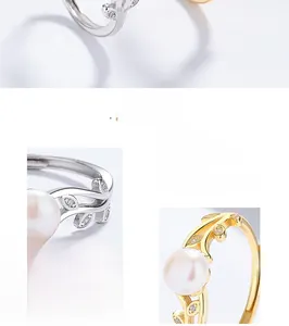 Detail of silver leaf ring with freshwater pearl and zircon inlay, macro view