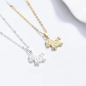 Detail view of gold and silver S925 sterling silver flying horse zodiac pendants