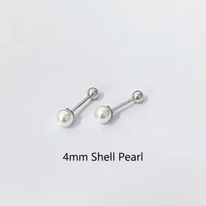 Detail view of 4mm shell pearl studs with S925 silver screw back minimalist design
