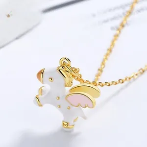 Close-up of S925 sterling silver unicorn pendant with pink wings and enamel details