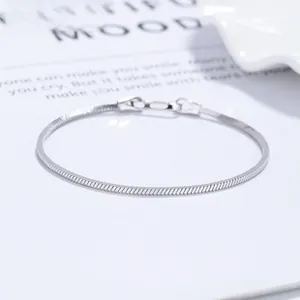 Detailed view of 925 sterling silver snake chain bracelet with textured flat links