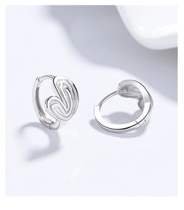 Close-up of 925 silver striped heart hoop earrings with elegant hollowed metal details
