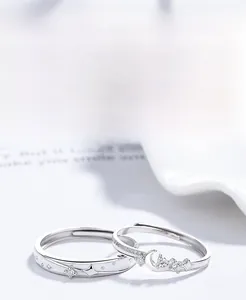 Detailed view of S925 silver star and moon rings with sparkling zircon inlay