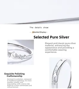 Macro detail of 925 sterling silver moon and star open ring with sparkling cubic zirconia