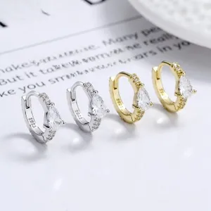 Detail of S925 sterling silver D-shaped hoop earrings with teardrop zircon pendants